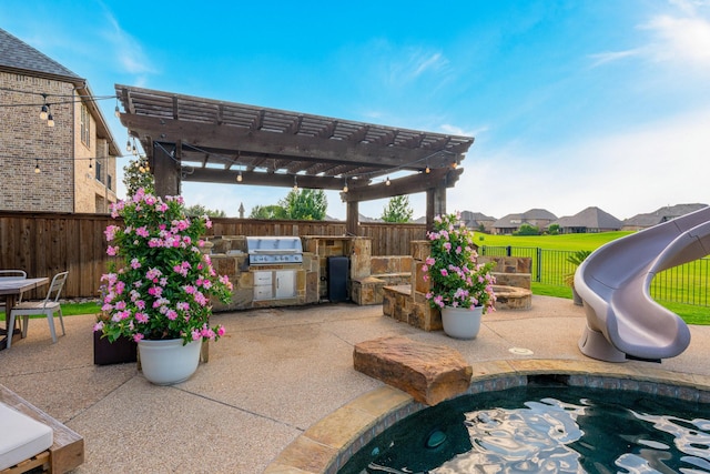 2223 Galloway Blvd, Trophy Club, TX 76262 - view of pool with exterior kitchen, a fenced backyard, a pergola, a patio, and a residential view