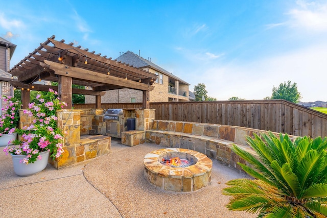 2223 Galloway Blvd, Trophy Club, TX 76262 - fenced backyard featuring a fire pit, area for grilling, a patio area, and a pergola