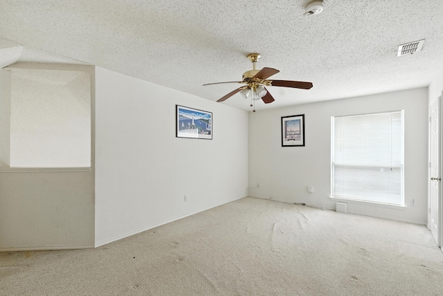 5004 Lodgepole Ln, Fort Worth, TX 76137 - carpeted spare room with a ceiling fan, a smoke detector, and a textured ceiling