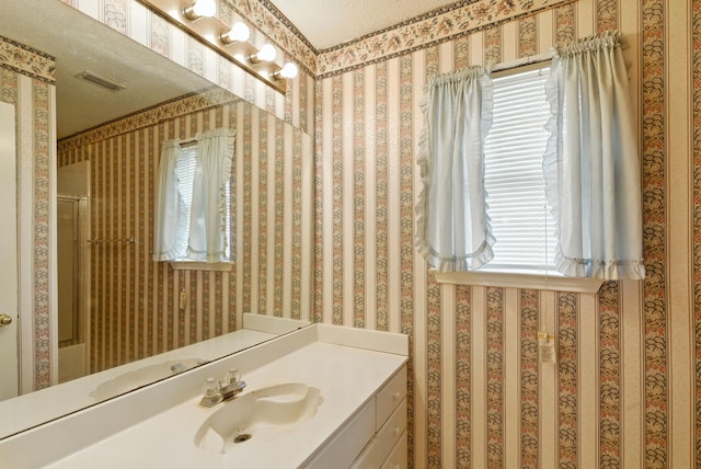 5004 Lodgepole Ln, Fort Worth, TX 76137 - full bathroom with vanity, a shower, and wallpapered walls