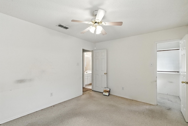 5004 Lodgepole Ln, Fort Worth, TX 76137 - unfurnished bedroom with light carpet, a spacious closet, and ceiling fan