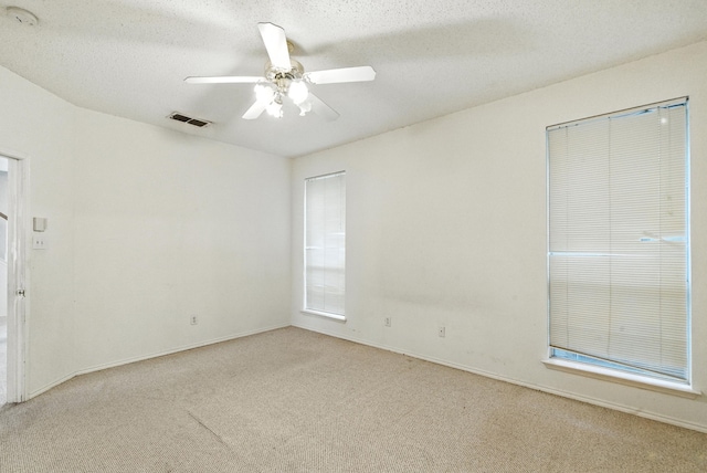 5004 Lodgepole Ln, Fort Worth, TX 76137 - carpeted spare room featuring ceiling fan, a smoke detector, and a textured ceiling