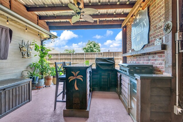 1402 White Water Ln, Rockwall, TX 75087 - view of patio / terrace featuring an outdoor kitchen and a ceiling fan