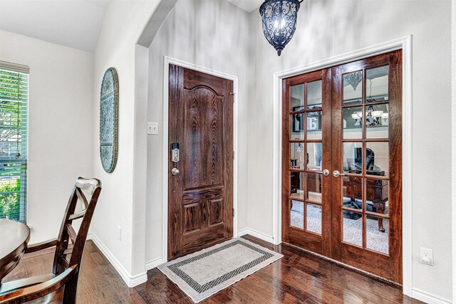 1402 White Water Ln, Rockwall, TX 75087 - foyer entrance featuring hardwood / wood-style flooring and french doors