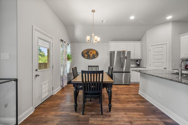 101 Paytons Way, Corsicana, TX 75110 - dining area featuring a chandelier, lofted ceiling, dark wood finished floors, and recessed lighting