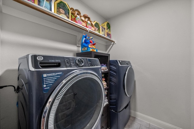 101 Paytons Way, Corsicana, TX 75110 - washroom featuring washing machine and clothes dryer and tile patterned flooring