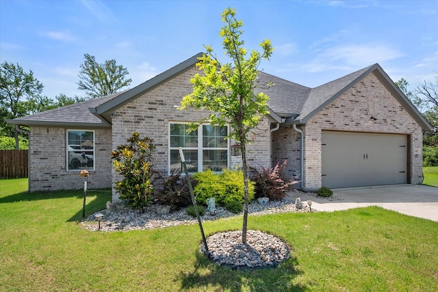 101 Paytons Way, Corsicana, TX 75110 - single story home featuring brick siding, a garage, driveway, and roof with shingles
