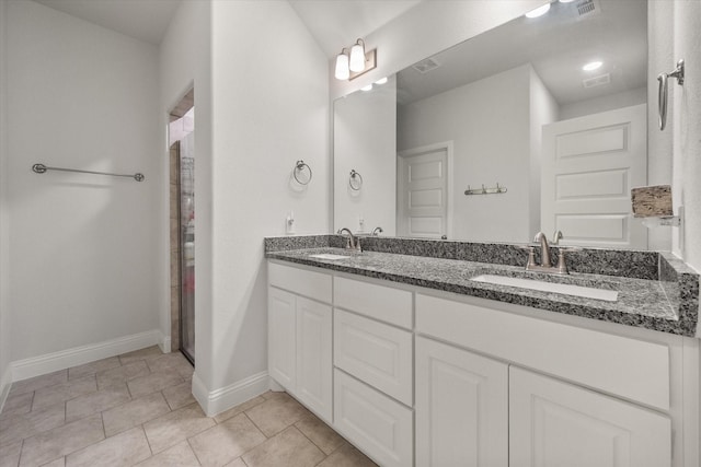 101 Paytons Way, Corsicana, TX 75110 - full bath featuring double vanity, a shower, and tile patterned flooring