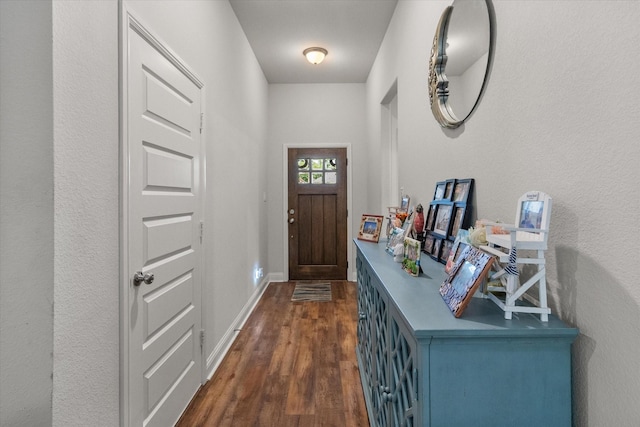 101 Paytons Way, Corsicana, TX 75110 - foyer entrance featuring dark wood finished floors and baseboards
