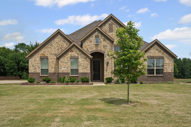 4919 Elizabeth Way, Lone Oak, TX 75453 - view of front of home featuring stone siding, a front lawn, brick siding, and roof with shingles