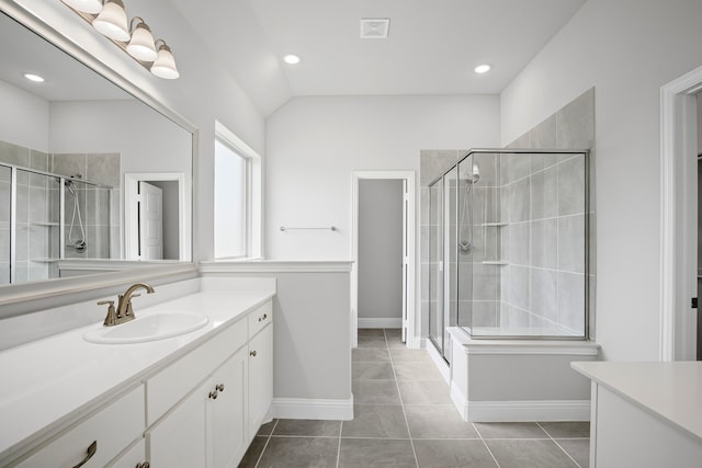 4919 Elizabeth Way, Lone Oak, TX 75453 - bathroom with vanity, a stall shower, tile patterned flooring, recessed lighting, and vaulted ceiling