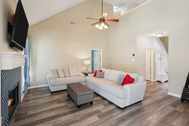 104 Northfield Cir, Hickory Creek, TX 75065 - living area featuring a tile fireplace, wood finished floors, ceiling fan, and high vaulted ceiling