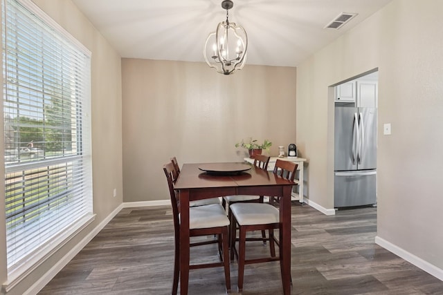 104 Northfield Cir, Hickory Creek, TX 75065 - dining area with a chandelier and dark wood-type flooring