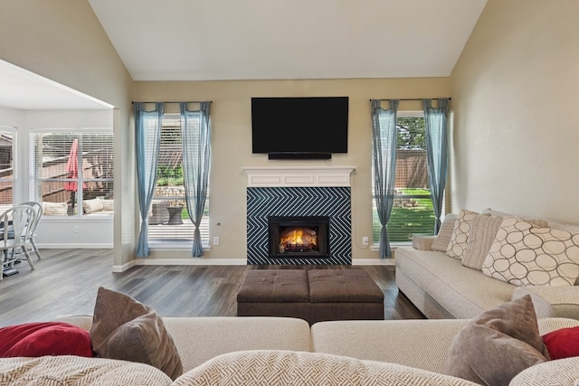 104 Northfield Cir, Hickory Creek, TX 75065 - living room featuring vaulted ceiling, wood finished floors, and a fireplace