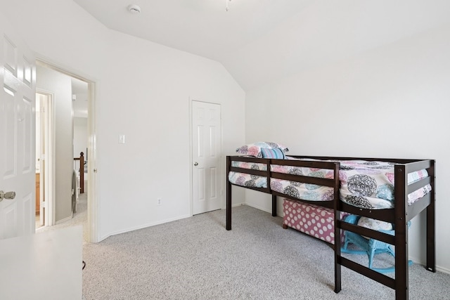 104 Northfield Cir, Hickory Creek, TX 75065 - carpeted bedroom featuring lofted ceiling and baseboards