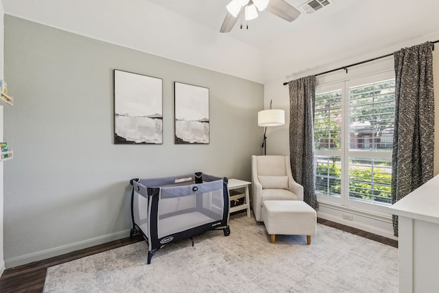 7716 Glenoaks Dr, Frisco, TX 75034 - sitting room with wood finished floors, ceiling fan, and lofted ceiling