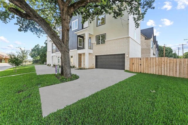 5115 Hohen Ave, Dallas, TX 75215 - view of front of home featuring brick siding, an attached garage, and concrete driveway