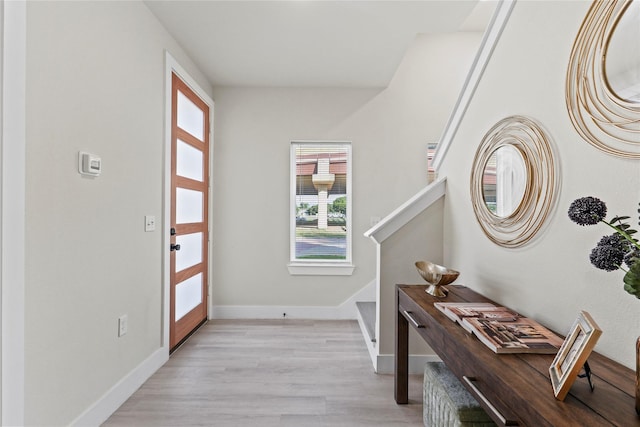 5115 Hohen Ave, Dallas, TX 75215 - entryway featuring light wood finished floors and stairs