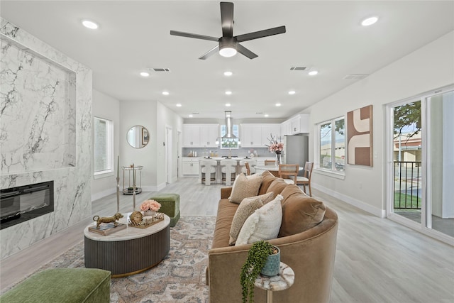 5115 Hohen Ave, Dallas, TX 75215 - living area featuring healthy amount of natural light, light wood finished floors, recessed lighting, and ceiling fan