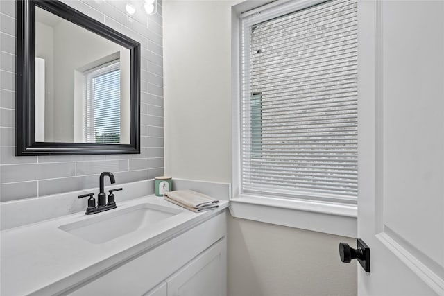 5115 Hohen Ave, Dallas, TX 75215 - bathroom featuring vanity and backsplash