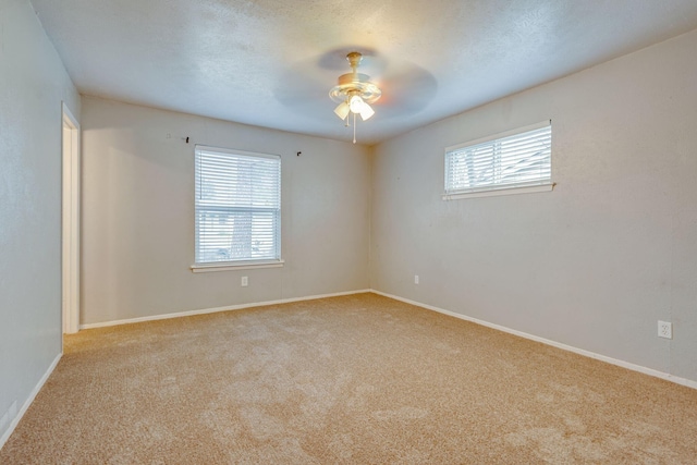 7212 Edinburg Dr, North Richland Hills, TX 76182 - carpeted empty room with healthy amount of natural light and ceiling fan