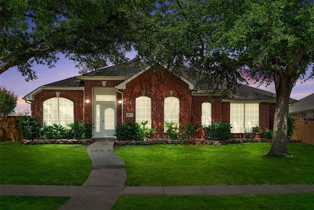 8709 Hartford Dr, Rowlett, TX 75089 - view of front of house featuring brick siding and roof with shingles