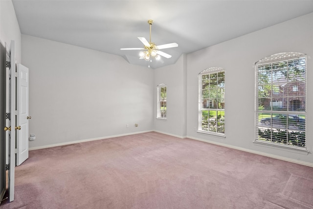 8709 Hartford Dr, Rowlett, TX 75089 - carpeted spare room featuring ceiling fan and lofted ceiling