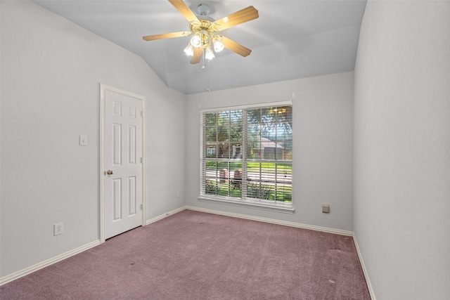 8709 Hartford Dr, Rowlett, TX 75089 - spare room featuring carpet, a ceiling fan, and vaulted ceiling