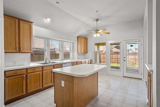 8709 Hartford Dr, Rowlett, TX 75089 - kitchen with light flooring, plenty of natural light, a ceiling fan, light countertops, and lofted ceiling
