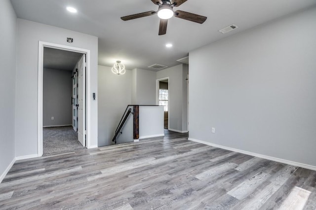 1004 Brae Loch Dr, Dallas, TX 75217 - unfurnished room with ceiling fan, wood finished floors, and recessed lighting
