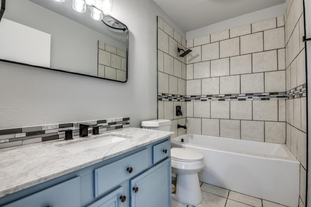 1004 Brae Loch Dr, Dallas, TX 75217 - full bath featuring vanity, bathtub / shower combination, and tile patterned flooring