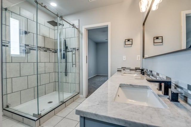 1004 Brae Loch Dr, Dallas, TX 75217 - bathroom with a shower stall, double vanity, and tile patterned flooring
