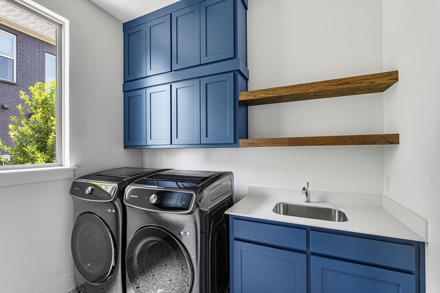 8990 Frostweed Rd, Frisco, TX 75035 - laundry area with washer and clothes dryer and cabinet space