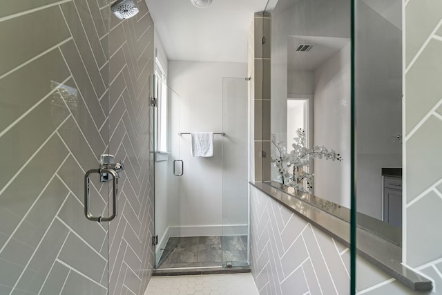 8990 Frostweed Rd, Frisco, TX 75035 - full bath featuring a shower stall and tile patterned flooring