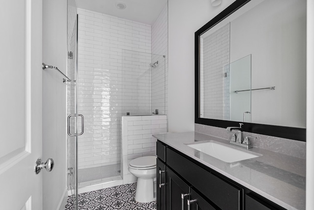 8990 Frostweed Rd, Frisco, TX 75035 - full bathroom featuring vanity, a shower stall, and tile patterned floors