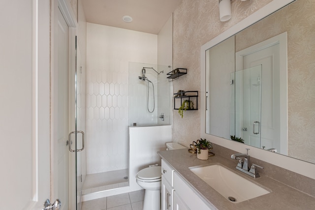 8990 Frostweed Rd, Frisco, TX 75035 - full bathroom featuring wallpapered walls, a shower stall, vanity, and tile patterned floors