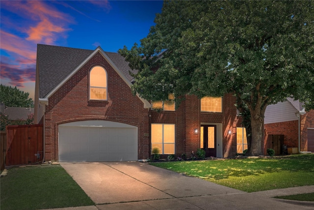 2124 Sandell Dr, Grapevine, TX 76051 - traditional-style home with driveway, brick siding, and an attached garage