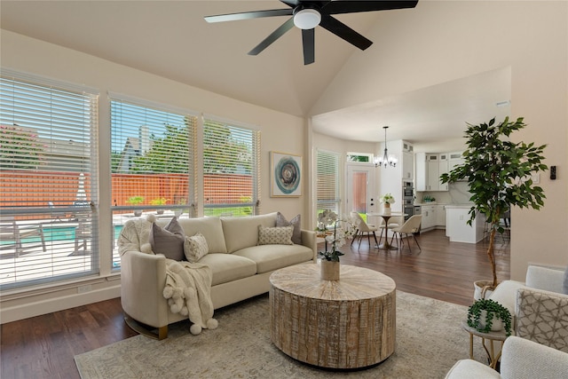 2124 Sandell Dr, Grapevine, TX 76051 - living room featuring a chandelier, dark wood-style floors, a ceiling fan, and high vaulted ceiling