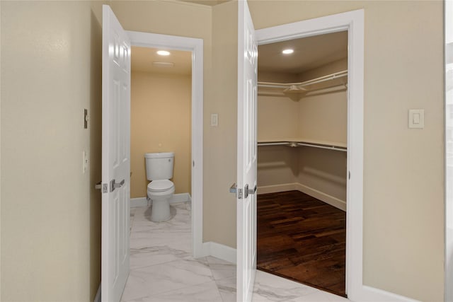 2124 Sandell Dr, Grapevine, TX 76051 - walk in closet featuring light marble finish floors