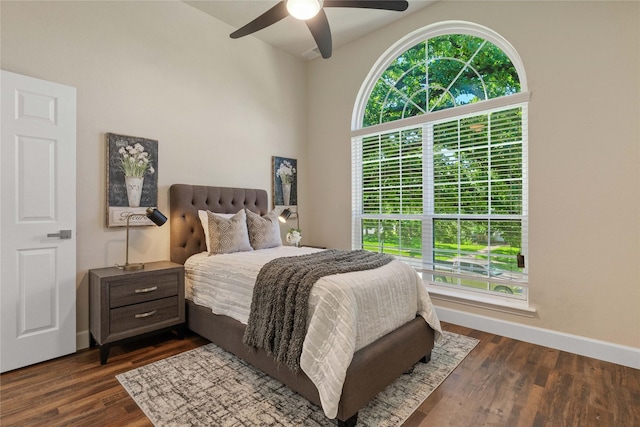 2124 Sandell Dr, Grapevine, TX 76051 - bedroom featuring dark wood finished floors and ceiling fan