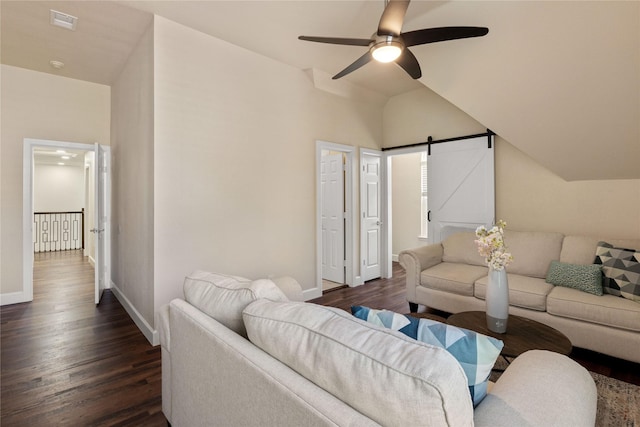 2124 Sandell Dr, Grapevine, TX 76051 - living area featuring dark wood-style flooring, ceiling fan, a barn door, and lofted ceiling