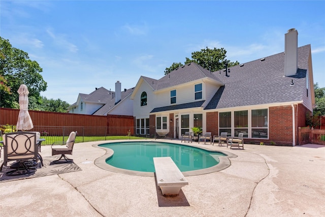 2124 Sandell Dr, Grapevine, TX 76051 - view of swimming pool featuring a patio area and a diving board