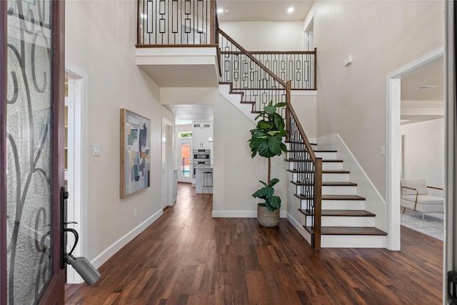 2124 Sandell Dr, Grapevine, TX 76051 - entrance foyer featuring stairway, dark wood-style floors, and a towering ceiling