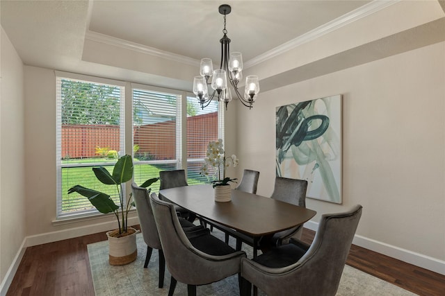 2124 Sandell Dr, Grapevine, TX 76051 - dining area featuring a chandelier, ornamental molding, healthy amount of natural light, and wood finished floors