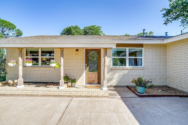 3025 Friendswood Dr, Arlington, TX 76013 - entrance to property with brick siding and a shingled roof