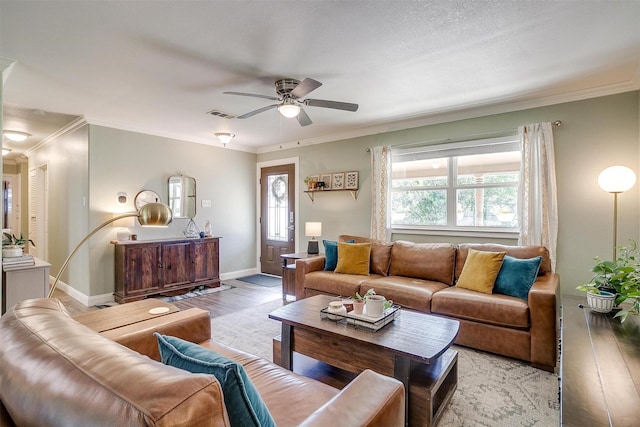 3025 Friendswood Dr, Arlington, TX 76013 - living area featuring a ceiling fan, crown molding, and light wood-type flooring