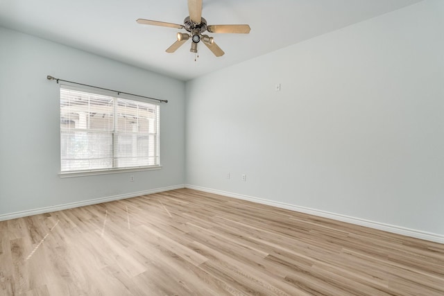 3102 Kings Rd Unit 2104, Dallas, TX 75219 - spare room featuring light wood-style flooring and ceiling fan