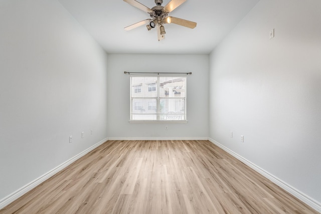 3102 Kings Rd Unit 2104, Dallas, TX 75219 - unfurnished room featuring light wood-style flooring and a ceiling fan