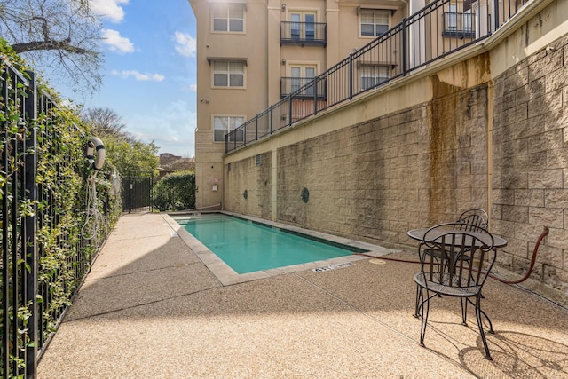 3102 Kings Rd Unit 2104, Dallas, TX 75219 - community pool featuring a patio