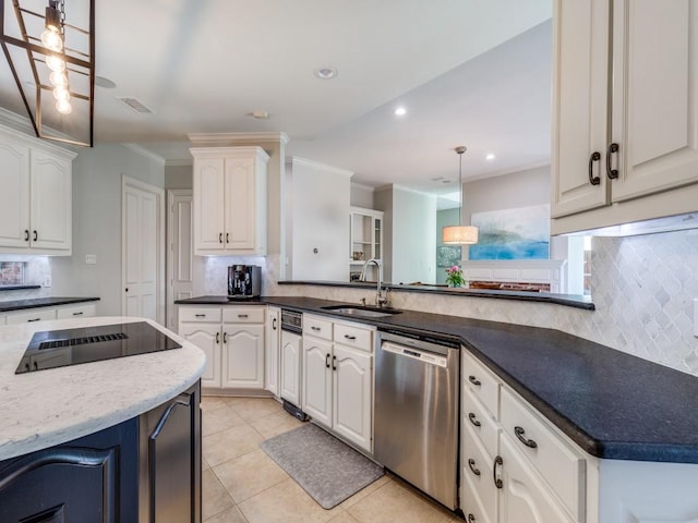 5909 Fossil Ridge Dr, Plano, TX 75093 - kitchen with dishwasher, black electric stovetop, backsplash, crown molding, and decorative light fixtures